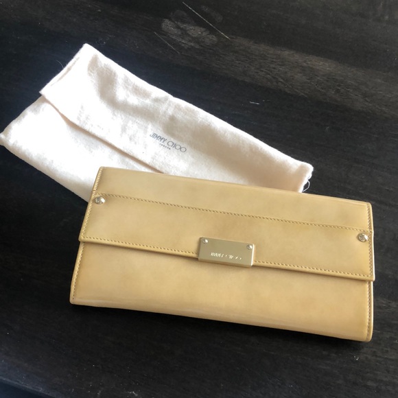 beige patent leather clutch